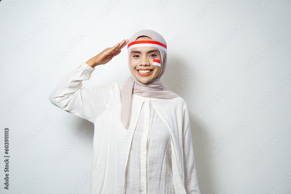Portrait of Young Asian Muslim Women celebrate Indonesian independence day isolated on white background Portrait of Young Asian Muslim Women celebrate Indonesian independence day isolated on white background