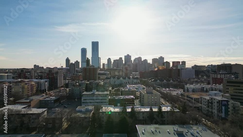 Drone reveal shot of downtown in the morning sun on a cold spring day photo