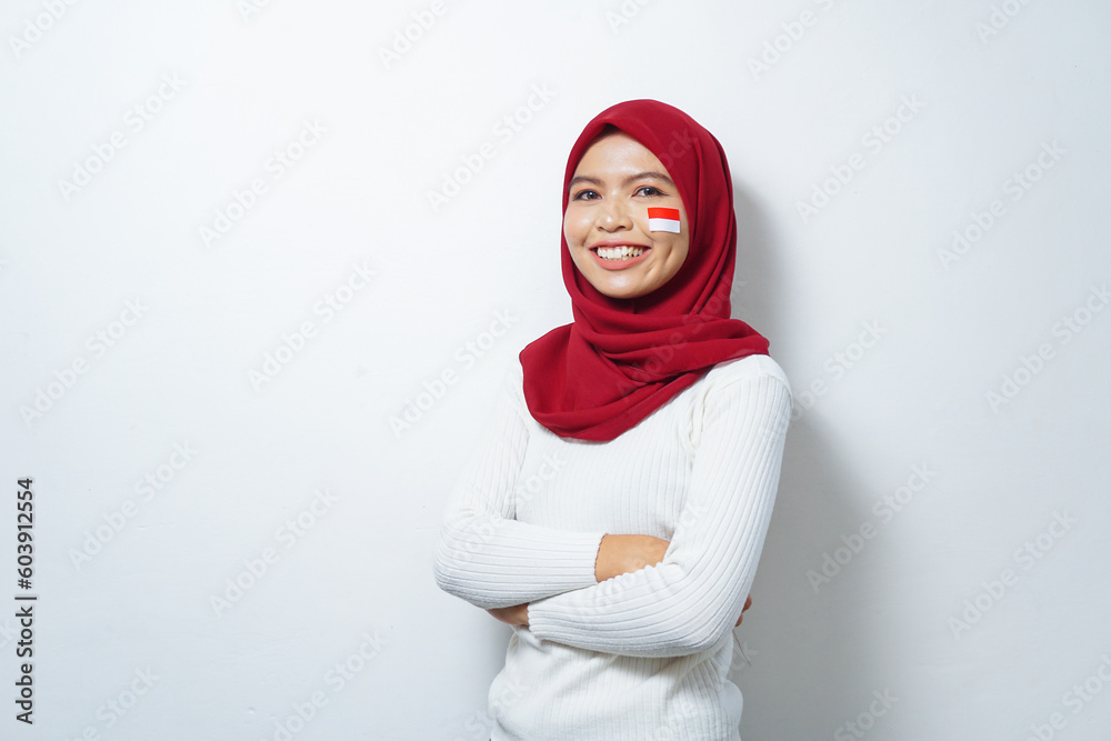Portrait of Young Asian Muslim Women celebrate Indonesian independence day isolated on white background Portrait of Young Asian Muslim Women celebrate Indonesian independence day isolated on white background