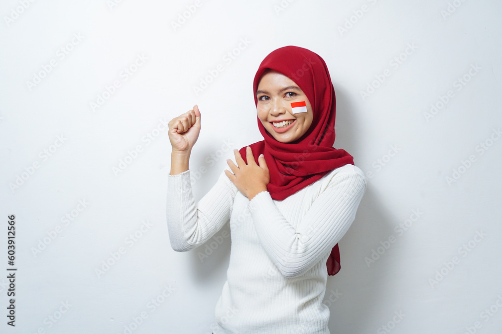 Portrait of Young Asian Muslim Women celebrate Indonesian independence day isolated on white background Portrait of Young Asian Muslim Women celebrate Indonesian independence day isolated on white background