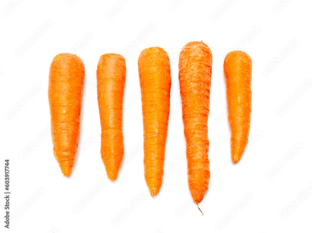 ripe washed carrots on a white background ripe washed carrots on a white background
