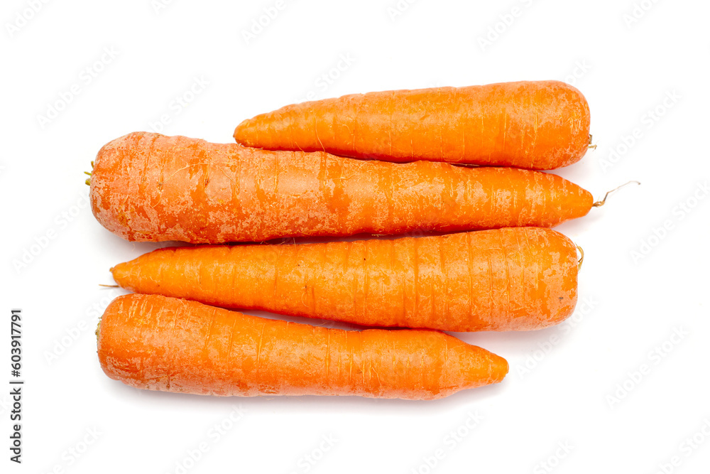 ripe washed carrots on a white background ripe washed carrots on a white background