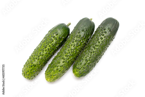 ripe cucumber with pimples on white background