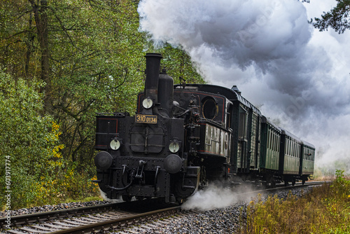 a ride on a historic steam tourist train pulled by a Czech locomotive