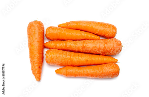 ripe washed carrots on a white background