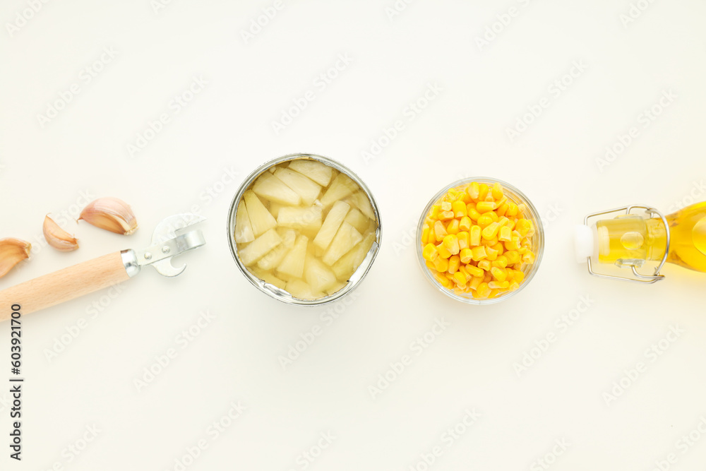 Ingredients for cooking salad with canned pineapple on white background Ingredients for cooking salad with canned pineapple on white background