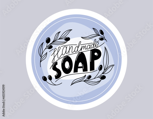 Handmade soap handwritten text lettering. Olive branches with berries and leaves. Vector isolated round label or sticker in flat style.