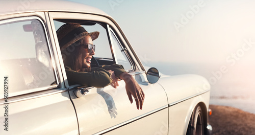 Road trip, window and view with a woman in a car for travel, freedom or a joyride as a tourist on the coast. Nature, sunset and relax with a young female traveler taking a drive outdoor for adventure