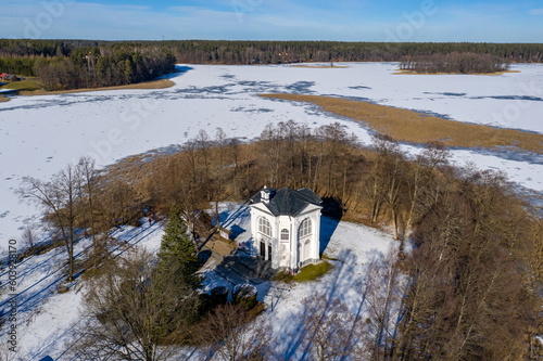 Wallpaper Mural Studzieniczna, Augustow - chapel on the island - winter drone aerial photography, Poland landscape on sunny day Torontodigital.ca