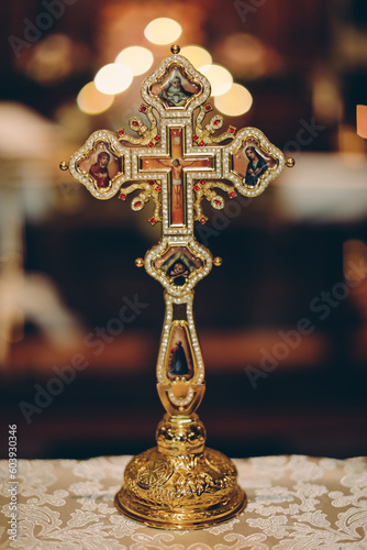golden cross on the table