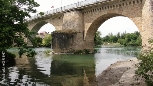 on the bank of the bridge photo