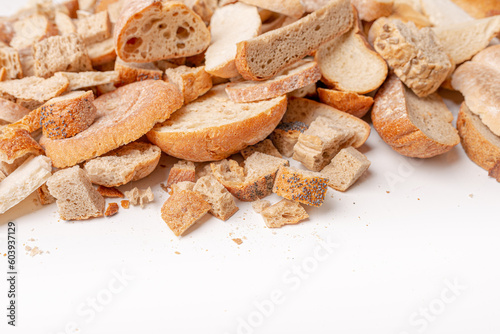 Slices of old, dry bread. Intended for a breadcrumbs of for the cattle. Dryied bread. Copyspace.