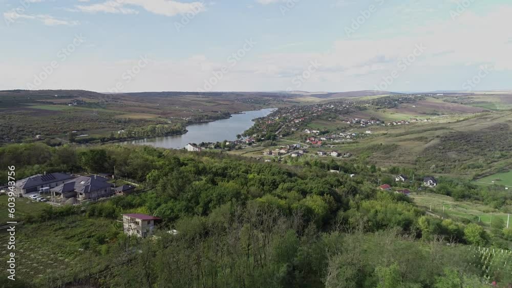 Flying Towards Stunning Water Dam Canal In Heart Of Green Nature Under Blue Sky