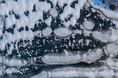 Wallpaper Mural Frozen lake top down drone photo - Wigry, Suwalszczyzna aerial photo, ice on water on winter Torontodigital.ca