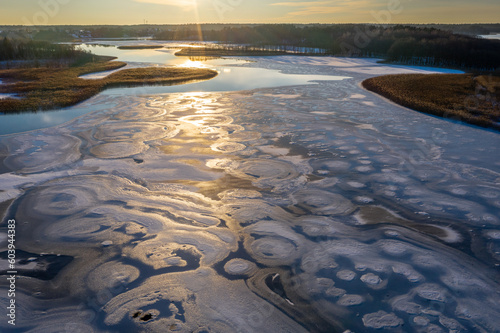 Wallpaper Mural Beautiful winter landscape - drone aerial photo sunset time - frozen Wigry lake, forest and sun reflections in water and ice Torontodigital.ca