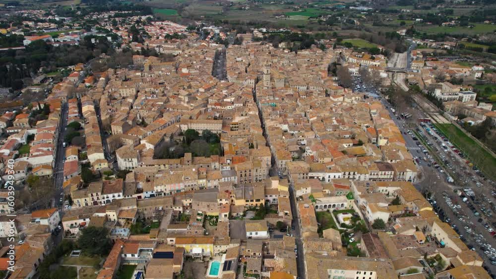 Aerial around the city Pezenas on a sunny day in early spring. Aerial around the city Pezenas on a sunny day in early spring.
