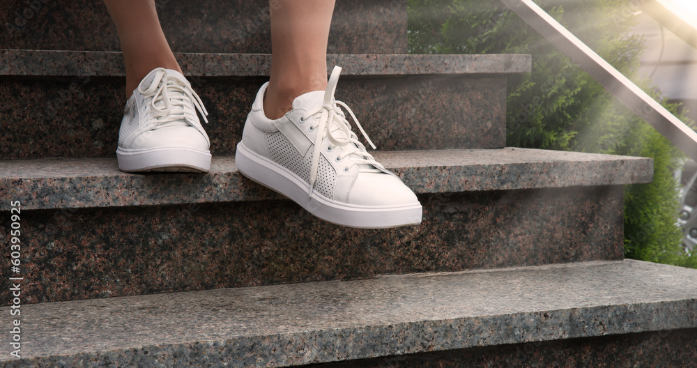 Foot stepping on a banana peel on steps Foot stepping on a banana peel on steps