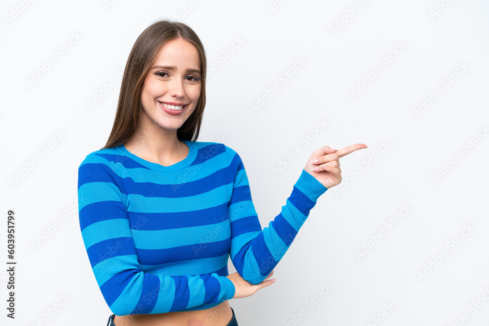 Young pretty caucasian woman isolated on white background pointing finger to the side Young pretty caucasian woman isolated on white background pointing finger to the side