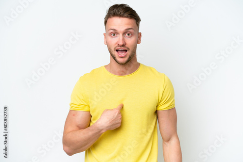 Young blonde caucasian man isolated on white background with surprise facial expression © luismolinero