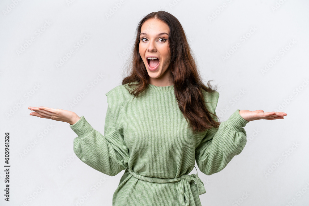 Young caucasian woman isolated on white background with shocked facial expression Young caucasian woman isolated on white background with shocked facial expression