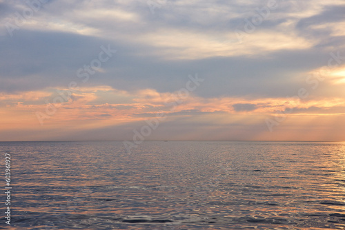 Clouds above sea during sunset