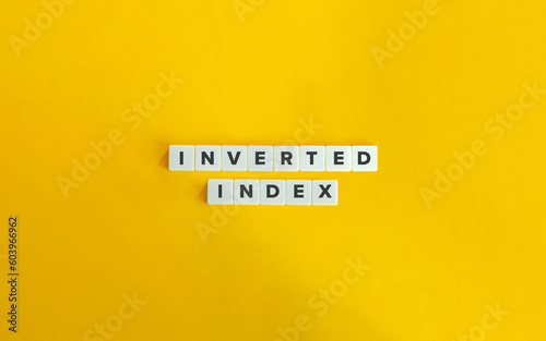 Inverted Index in Computer Science. Concept Image. Block Letter Tiles on Yellow Background. Minimal Aesthetics.