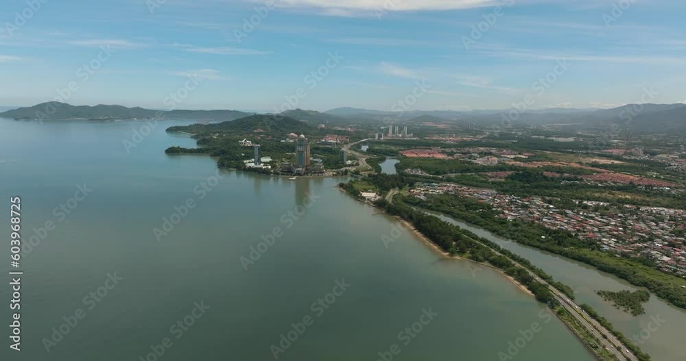 Aerial view of city of Kota Kinabalu on the island of Borneo. Sabah, Malaysia. Aerial view of city of Kota Kinabalu on the island of Borneo. Sabah, Malaysia.