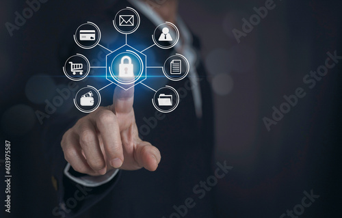 .Cybersecurity and privacy concepts to protect data..Businessman hand touch the lock icon and internet  network technology on virtual screen interfaces.
