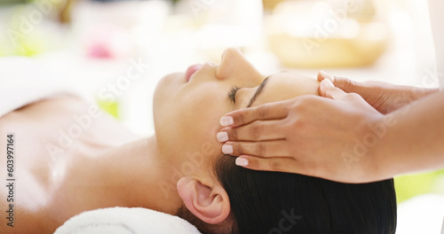 Woman, hands and sleeping in face massage at spa for zen, physical therapy or healthy wellness in relax at resort. Calm female person relaxing or sleep in luxury facial treatment or relief at salon