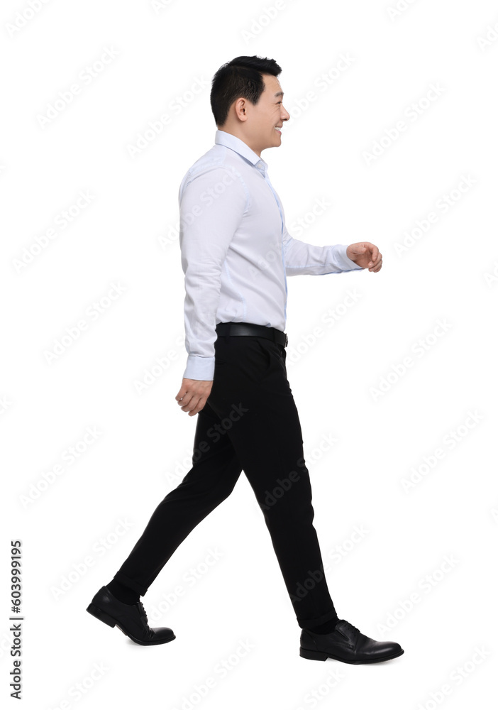 Businessman in formal clothes walking on white background Businessman in formal clothes walking on white background