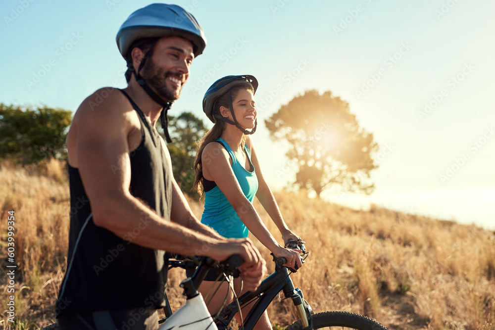 Happy couple, nature and cycling in the mountains for fitness and exercise together. Bike, wellness and young people with outdoor adventure and sports training with happiness and freedom mockup