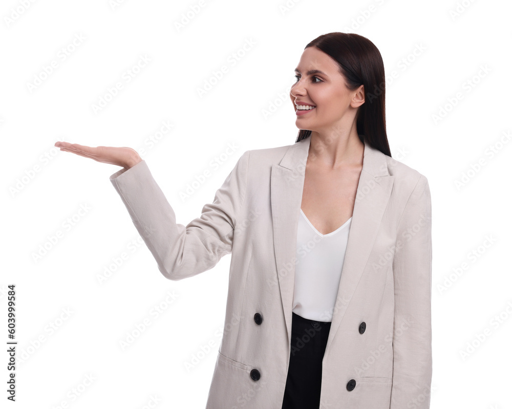 Beautiful businesswoman in suit pointing at something on white background Beautiful businesswoman in suit pointing at something on white background