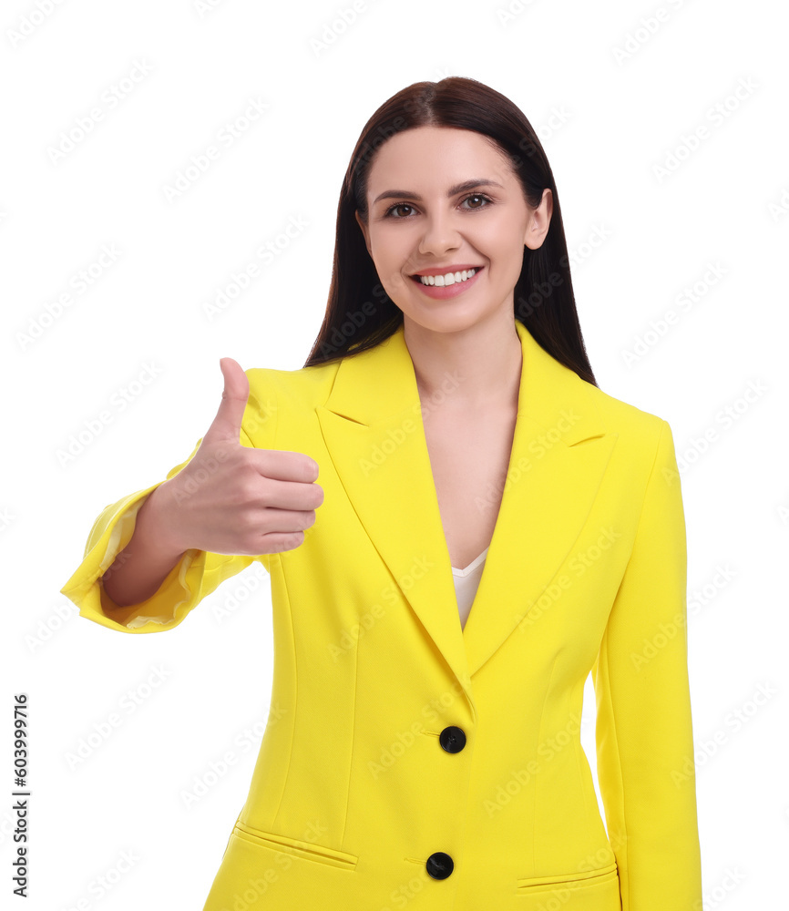 Beautiful happy businesswoman in yellow suit showing thumbs up on white background Beautiful happy businesswoman in yellow suit showing thumbs up on white background