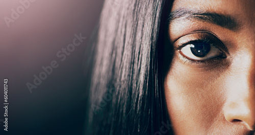 Portrait, closeup and woman with mockup, eye and health against a dark studio background. Face, female person and model with focus, retina and clear vision with eyebrow, lashes and microblading