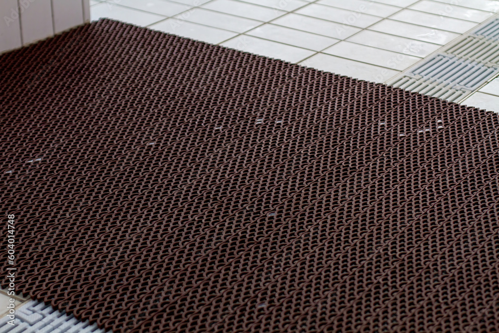 Anti-slip mat on the tile in the pool. - obrazy, fototapety, plakaty 