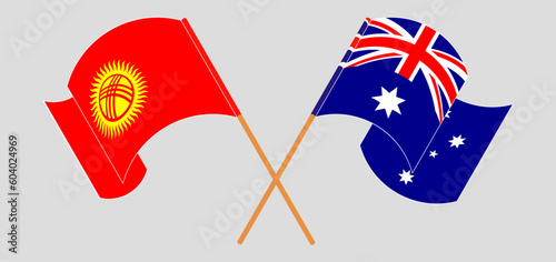 Crossed and waving flags of Kyrgyzstan and Australia