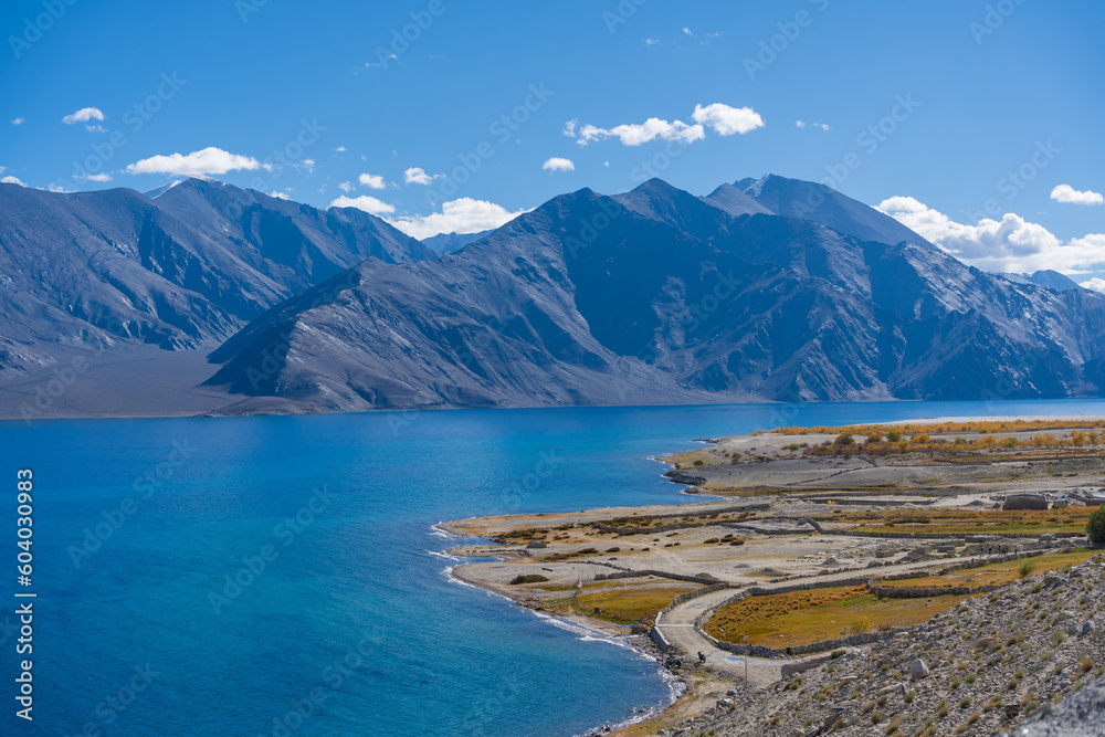 Pangong Lake in Ladakh, North India. Pangong Tso is an endorheic lake in the Himalayas situated at a height of about 4,350 m. It is 134 km long and extends from India to Tibet Pangong Lake in Ladakh, North India. Pangong Tso is an endorheic lake in the Himalayas situated at a height of about 4,350 m. It is 134 km long and extends from India to Tibet