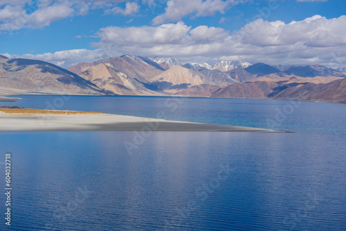 Mountains and Pangong tso  Lake . It is huge lake in Ladakh  altitude 4 350 m  14 270 ft . It is 134 km  83 mi  long and extends from India to Tibet. Leh  Ladakh  Jammu and Kashmir  India