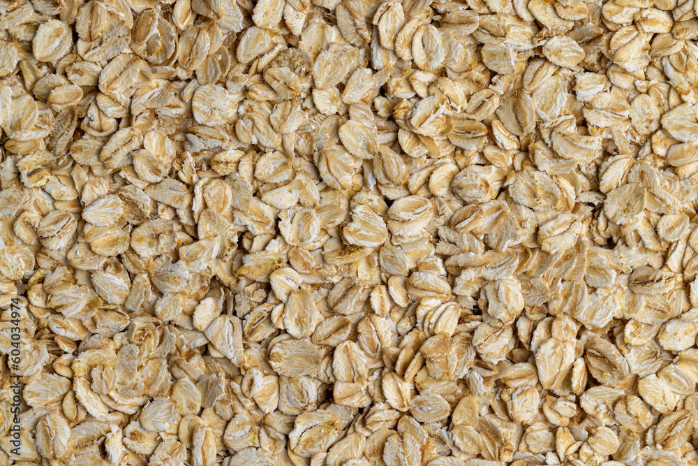 Poured a large amount of oat flakes close-up Poured a large amount of oat flakes close-up