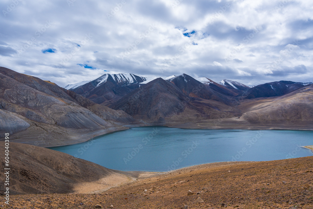 The Mirpal lake is between the mountains. This lake is located on the way from Pangong Lake to Tso Moriri, Ladakh, India