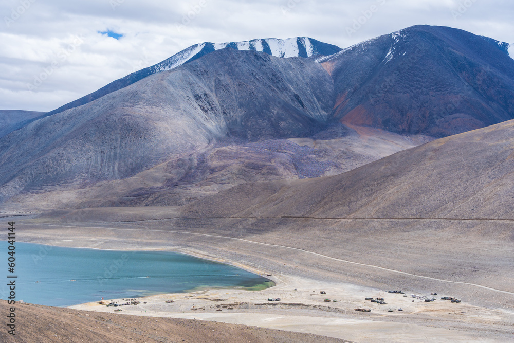 Mirpal Tso - Lake Ladakh, an isolated, unexplored freshwater lake surrounded by white sand and mountains Mirpal Tso - Lake Ladakh, an isolated, unexplored freshwater lake surrounded by white sand and mountains
