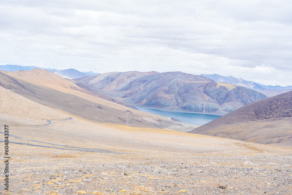 the road from Pangong Lake to Tso Moriri with desert and mountain , Ladakh, India the road from Pangong Lake to Tso Moriri with desert and mountain , Ladakh, India