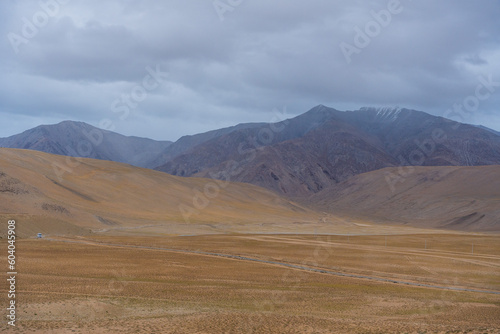 Landscape of Desert mountains against clouds sky at the way from Pangong Lake to Tso Moriri  Leh  Ladakh  Jammu and Kashmir  India
