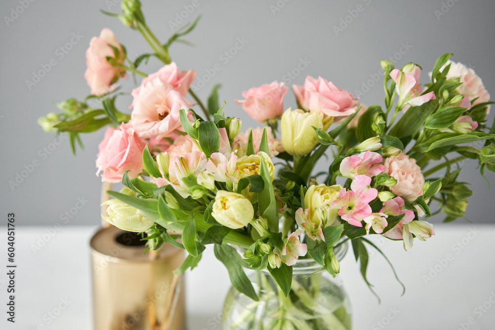 Fototapeta premium Bouquet 001. Finished flower arrangement in a vase for home. Flowers bunch, set for interior. Fresh cut flowers for decoration home. European floral shop. Delivery fresh cut flower.