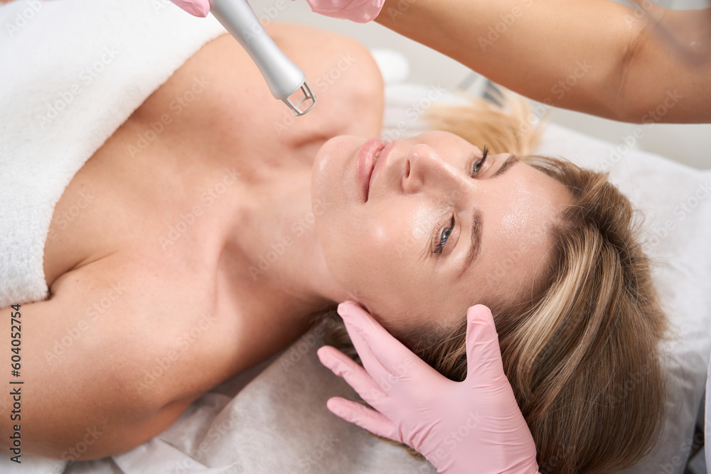 Top view of lady on laser skin resurfacing procedure
