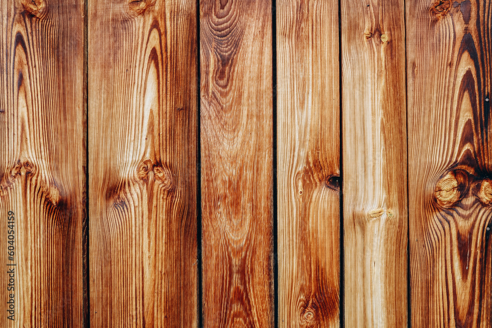 Naklejka premium Beautiful wooden texture of rich orange color