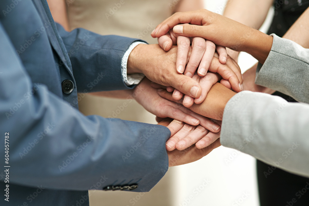 Business people, meeting and hands together in agreement for collaboration at the office. Hand of group piling for teamwork motivation, trust or support in solidarity for company goals at workplace