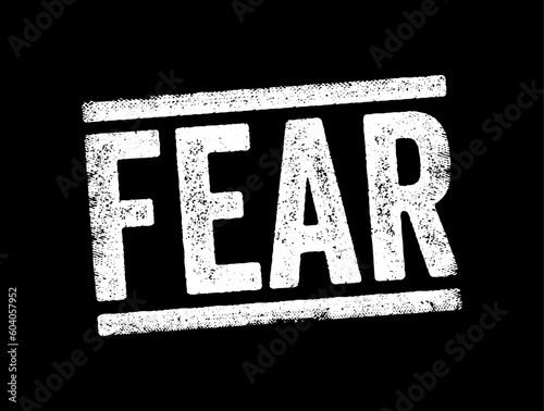 Fear is an intensely unpleasant emotion in response to perceiving or recognizing a danger or threat, text concept stamp
