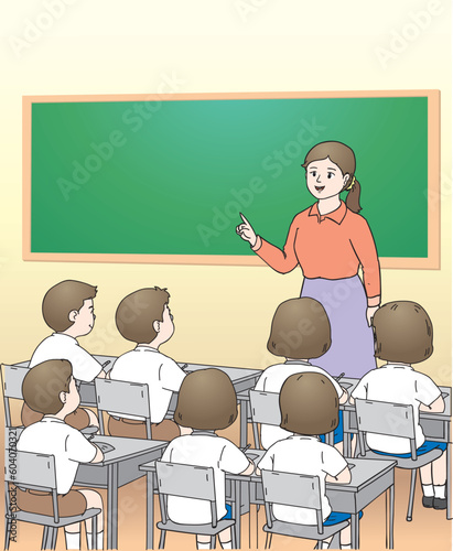 Students listen to teaches in the classroom.