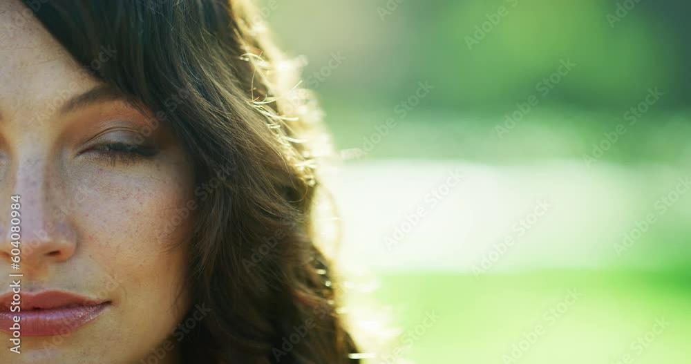 Half face, serious and a woman in nature with mockup for summer news, peace and space. Looking, calm and portrait of a young girl on a blurred background in a park for sun, weekend and a break Half face, serious and a woman in nature with mockup for summer news, peace and space. Looking, calm and portrait of a young girl on a blurred background in a park for sun, weekend and a break